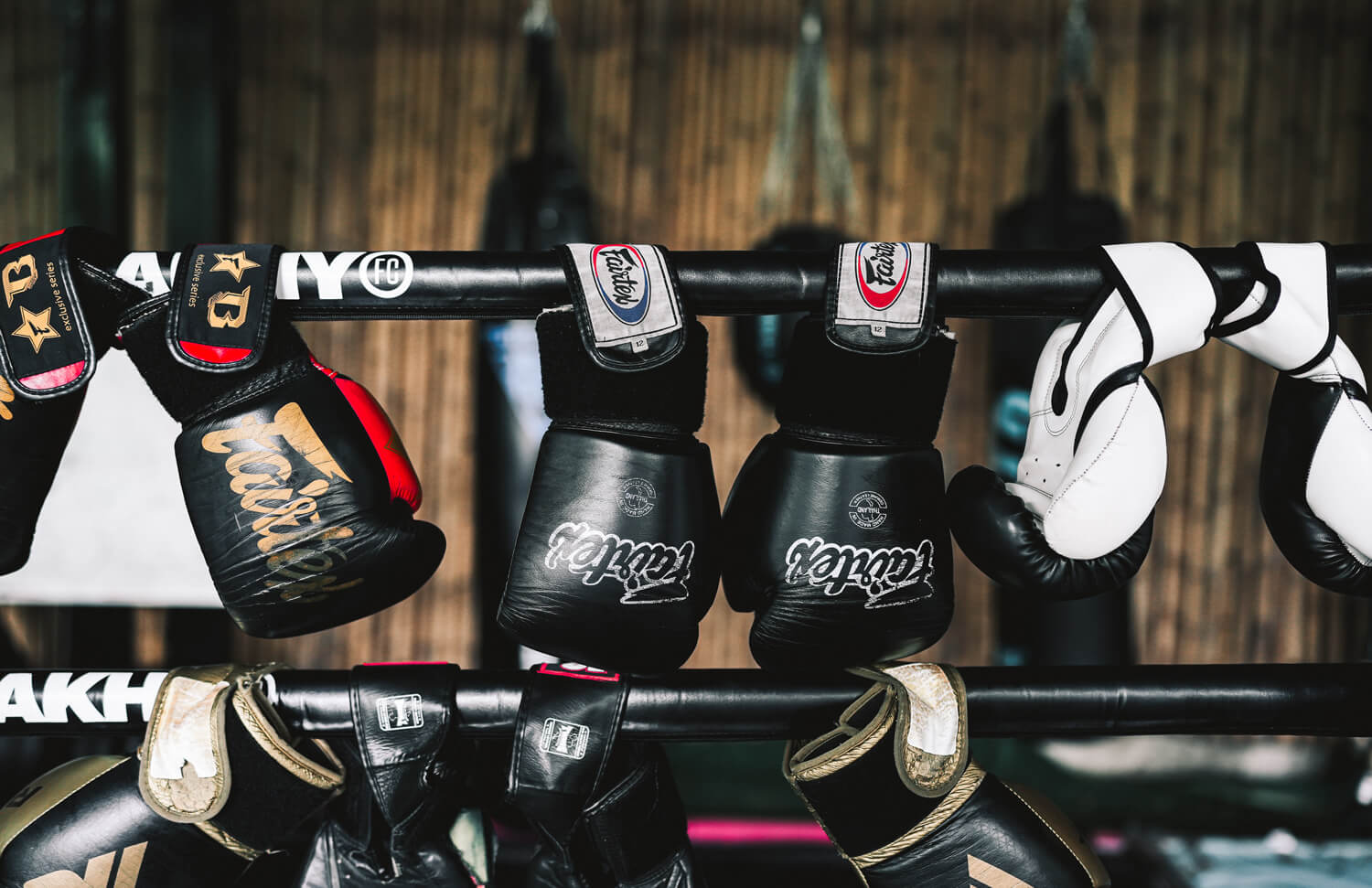 Boxing gloves hanging on the ring ropes at Tiger Eye